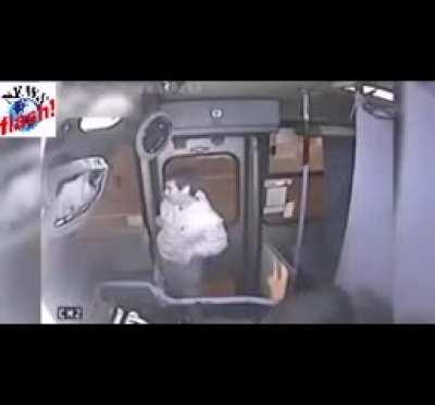 The man playing the stupid game is second from last in this line, a lady on the front seat just off camera has her purse in her lap.