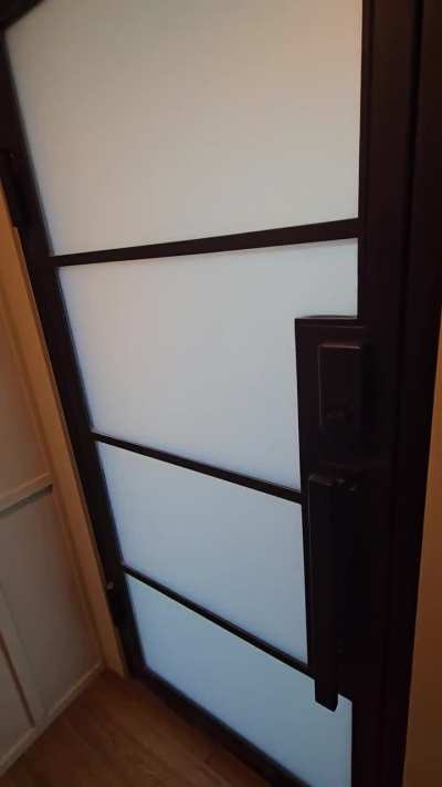 Polymer dispersed liquid crystal glass door goes from frosted when powered off to clear when powered on.