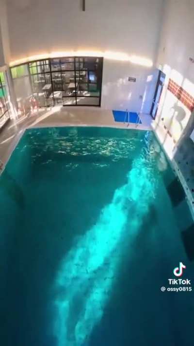 The way the water opens up for a brief moment then closes around him