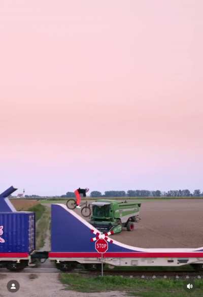 Dawid Godziek, the 2024 Slopestyle World Champion, riding his bike on a moving train. A world-first feat