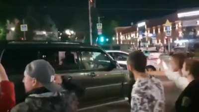 RU POV: Russian Citizens who Support the Wagner PMC Group spoke to Yevgeny Prigozhin and thanked him as his Car left the Southern Military District Headquarters in the City of Rostov.