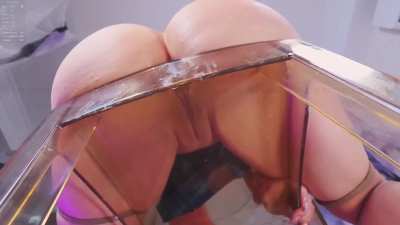 Looking up at Molly's holes while she's on a see-thru chair!