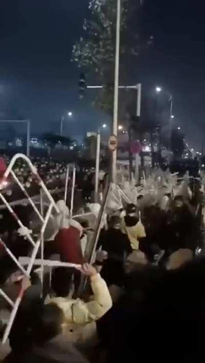 Chinese police beaten back by Foxconn workers who are protesting bad Covid lockdown conditions and no wages
