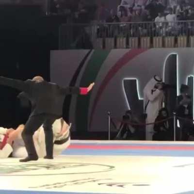 Tommy langaker hitting omoplata sweep to berimbolo to choke.