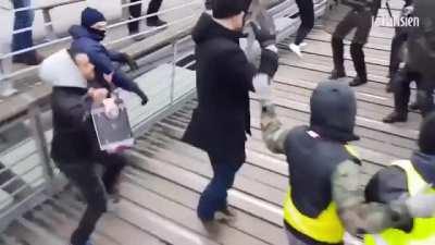 A former French boxing champion has been convicted for assaulting two police officers at an anti-government 