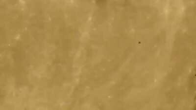 Fleet of UFOs flying across the moon (sighted in Russia)