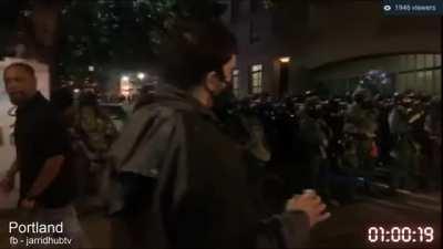 Random black Portland resident tells white Portland BLM supporter harassing cops to get lost