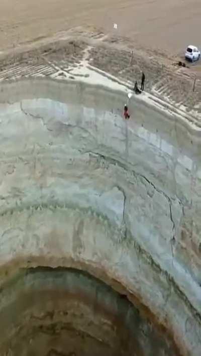 Giant sinkhole at the middle of a farm in Konya, Turkey.