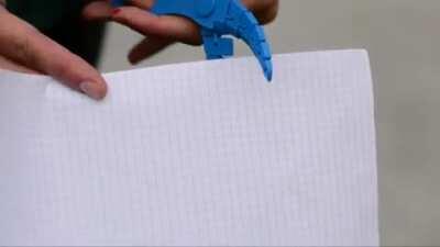 3D printed on a pair of articulated scissors