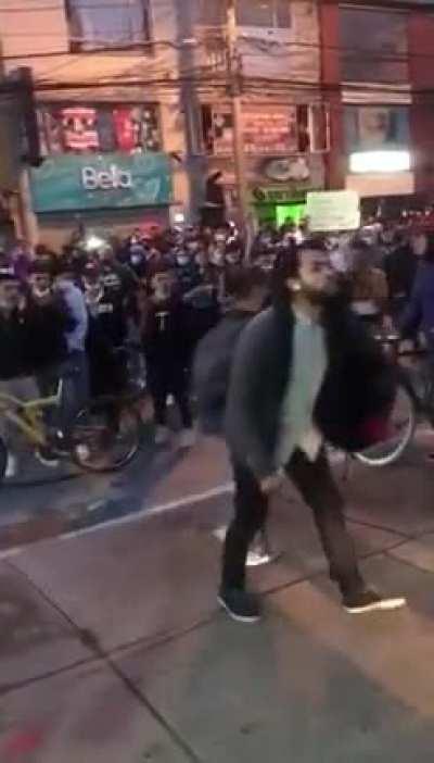 Bogota: Citizens created a human shield to protect a Police Station and officers against the Protesters. The citizens were attacked and threatened