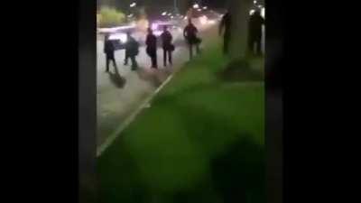 Police shooting guys trying help a downed individual