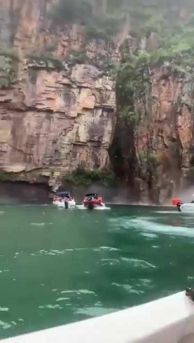 Rock falls on boats