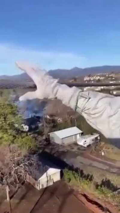 Man grabbing high voltage electric cable