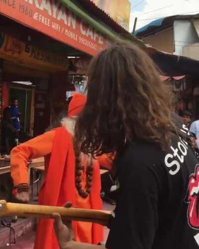 Love how indian sadhu has immersed himself with melody & expressed himself fully.