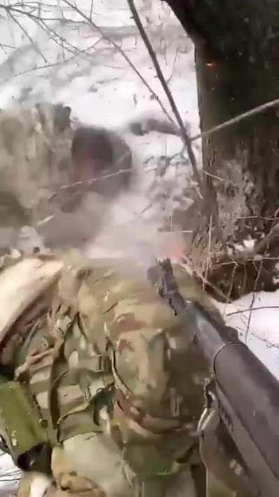 RU pov: An UA soldier executes a RU soldier. Extremely graphic.