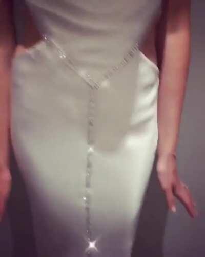 Gal looking breathtaking in a white dress