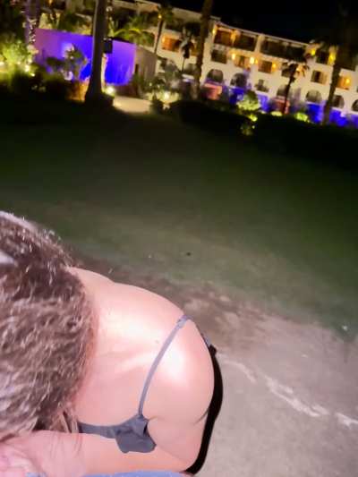 Blowing my husband out front of our resort in Mexico 