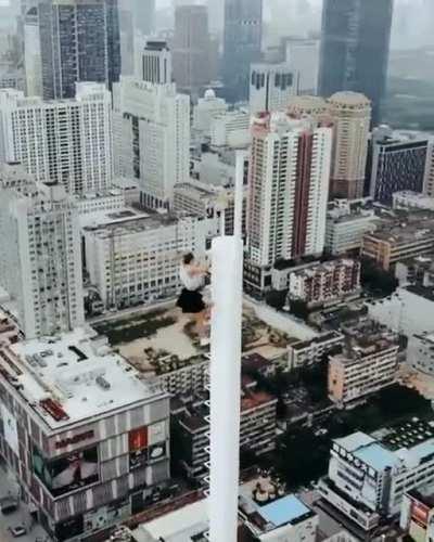 Just casually climbing a transmission tower.