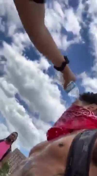 Police Sergeant casually pepper spraying protestor