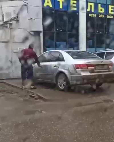 Don't smash this guy's car with a hammer and then walk in front of it