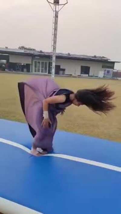 When a gymnast does flips in a saree.