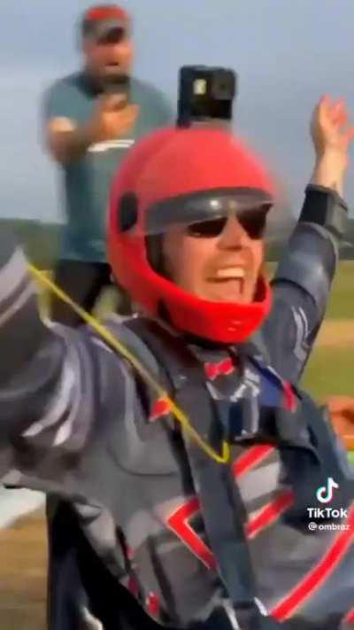Parachute landing into slip-n-slide