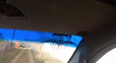 Russian soldiers record themselves getting hit by a Ukrainian FPV drone while driving (Belgorod Oblast)