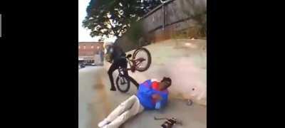Getting hit by the head with a bike