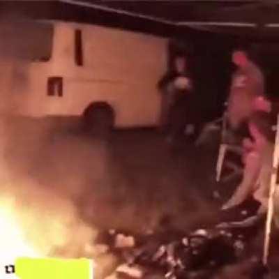 Bicycling beside fire