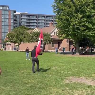 [Chicago] Nazi flag waved near Hamas Palestine protesters at the DNC (August 21 2024)
