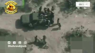 A large group of Houthis and pickup truck and a motorcycle gathered in the middle of the road were bombed by the Saudi Air Force in Yemen-Saada (date unknown)