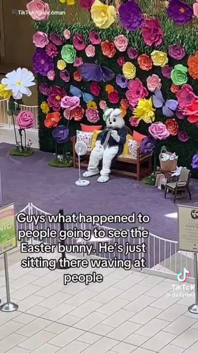 Easter bunny sits alone at the mall with no company