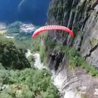 Gliding through the mountains & valley below