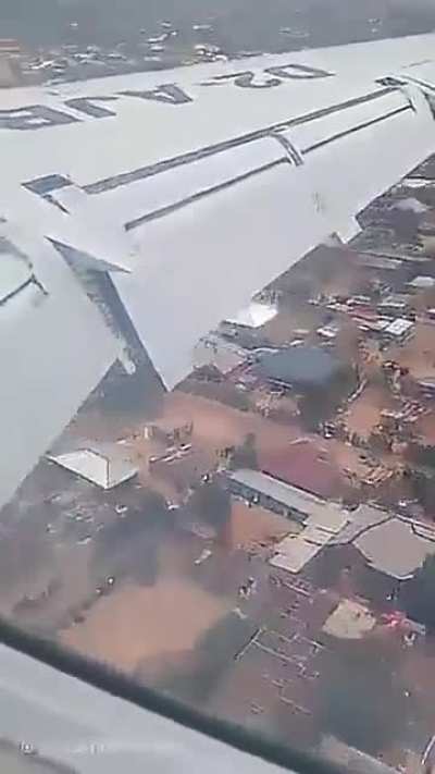 Passengers freakout  and film from inside when their plane crash-lands