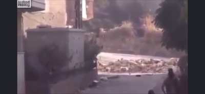 Grenade lands amongst a group of Syrian rebels