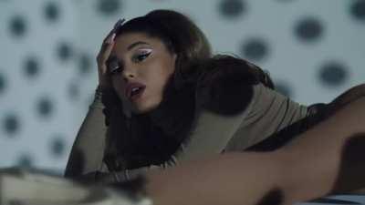 Ariana Grande looks like she’s getting pounded from behind