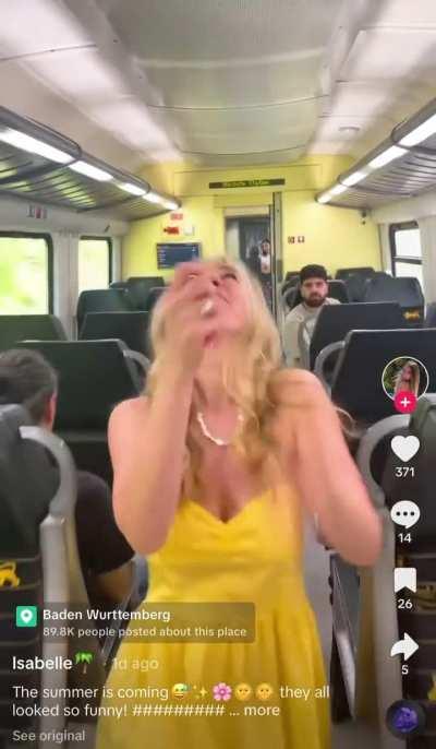 German bikini designer dances her way through a train car on TikTok