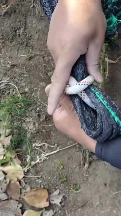 How to tie a tarp corner knot to make shelter or tent