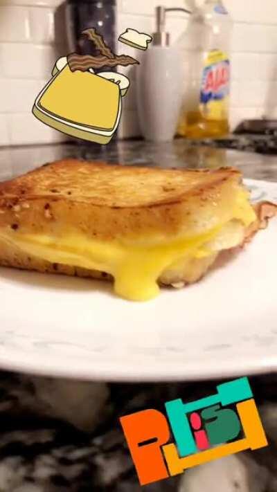 Meet the Split-Open-And Melt: a double decker, garlic butter grilled ham and cheese