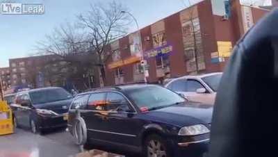 A roadrage fight with baseball bats turns escalates as one man tries to run over the other with his car and crashes into a storefront [Queens, NY]