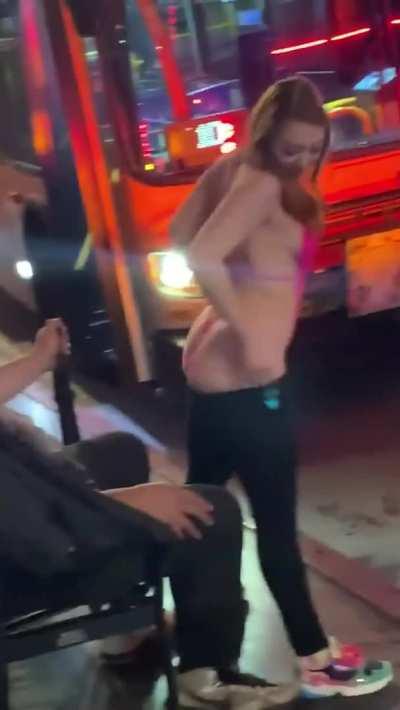 Redhead gives a lap dance to a stranger at the bus stop!