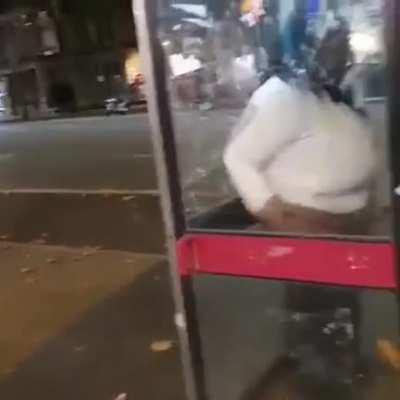 That's not the way you use a telephone booth ma'am