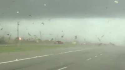 I can't believe how that red van got out of this tornado unscathed