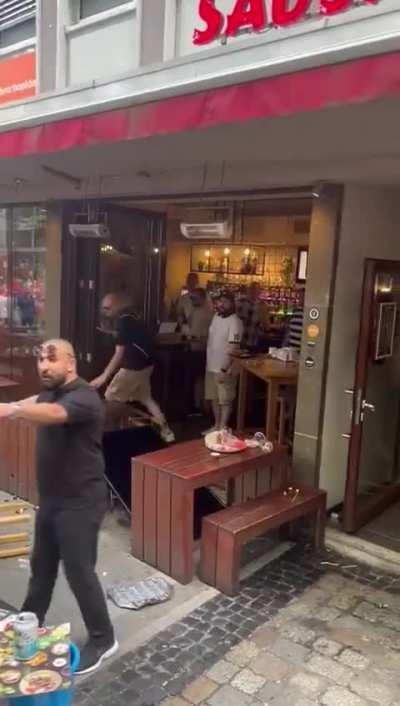 Dutch fans attacking a pub full of English fans