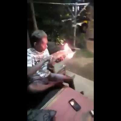 Guy set his friend's meal on fire