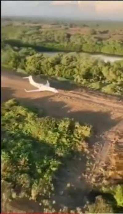 Narco jet escapes military helicopter.