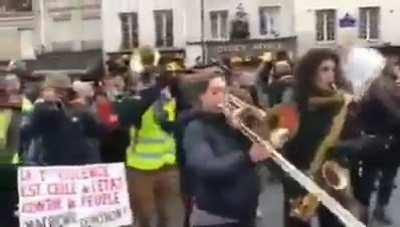 the brass section, bringer of music, slayer of cops