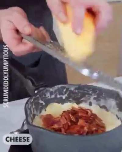 Potatoes au gratin served inside a deep fried steak cone