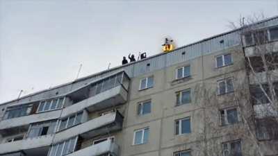 Man sets himself on fire and jumps off building into snow (sfw I promise)
