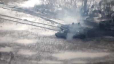 Russian tank crewman runs away on fire after his tank was hit. Vuhledar 2023.